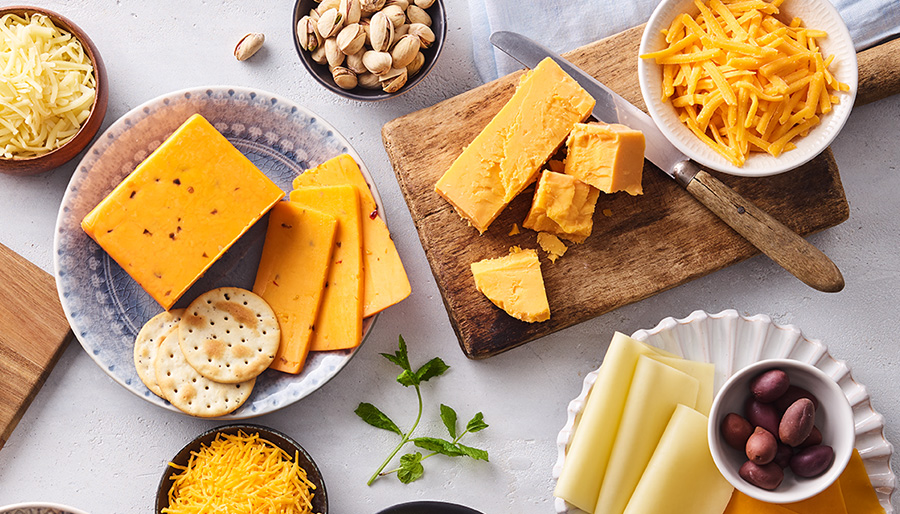 Charcuterie board with assortment of cheeses