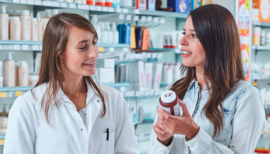 In a pharmacy talking about probiotics